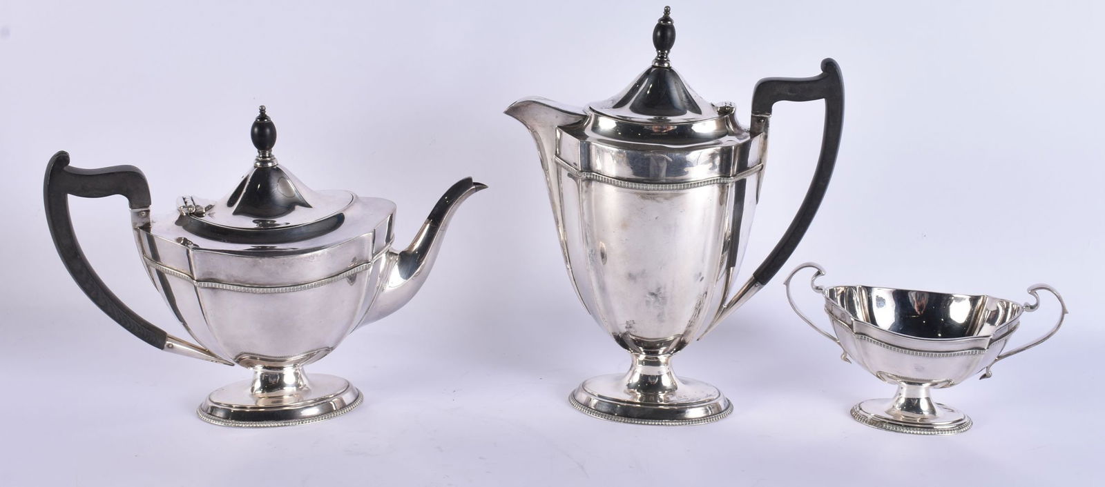 AN ANTIQUE SILVER PLATED TEASET. Largest 27cm high. (3) (1 of 6)