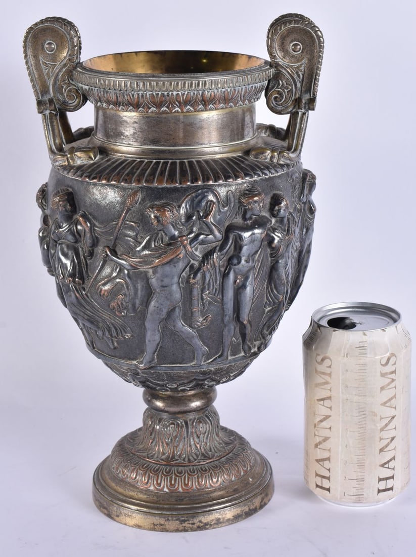 A 19TH CENTURY GRAND TOUR SILVER PLATED BRONZE VASE decorated with classical scenes. 30 cm x 12 cm. (1 of 8)