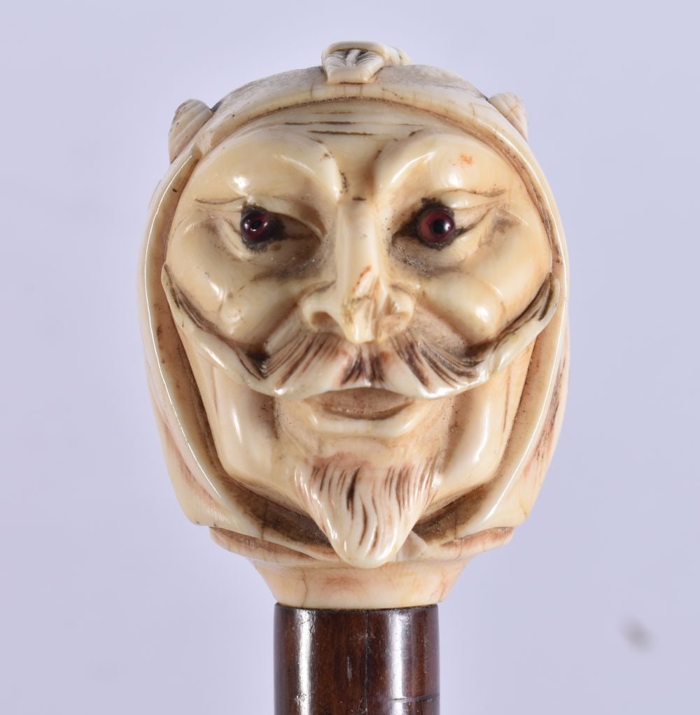 A VICTORIAN MEPHISTOPHELES WALKING CANE. 88 cm long. (1 of 6)