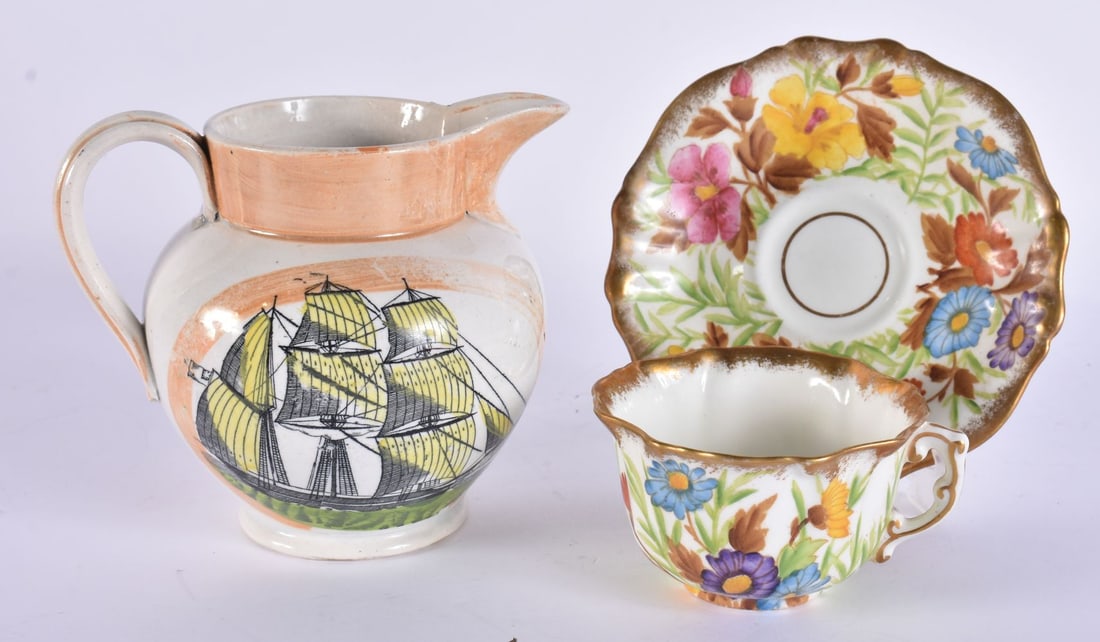 A 19TH CENTURY SUNDERLAND LUSTRE TYPE MARITIME JUG together with a Hammersley cup. (3): A 19TH CENTURY SUNDERLAND LUSTRE TYPE MARITIME JUG together with a Hammersley cup. (3)