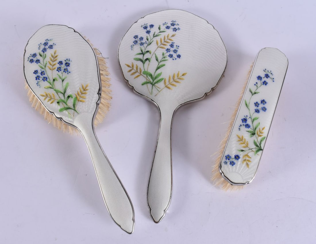 A 1940S SILVER PLATED ENAMEL DRESSING TABLE SET. Largest 27cm long. (3) (1 of 5)