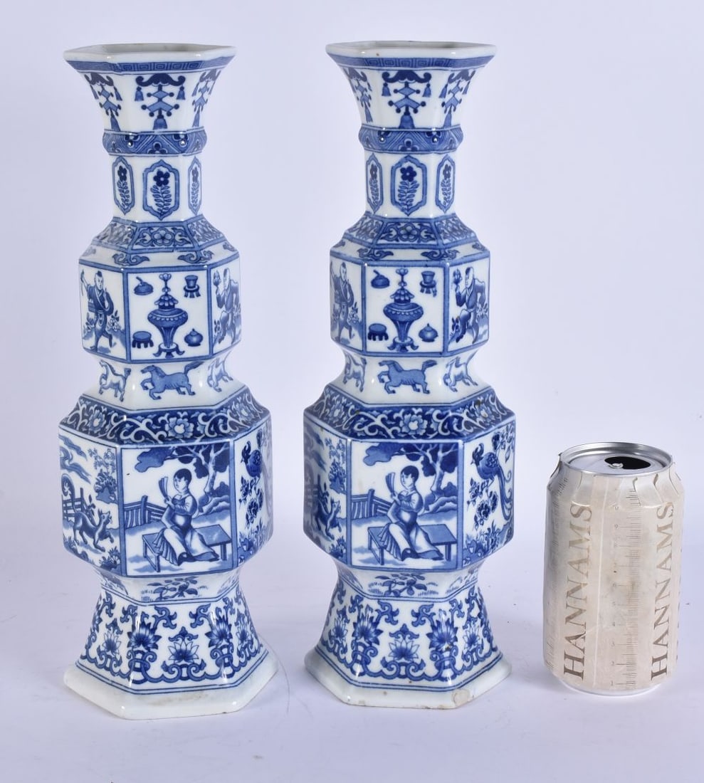 A LARGE PAIR OF CONTINENTAL BLUE AND WHITE PORCELAIN VASES modelled in the Chinese Kangxi style. 33 (1 of 6)