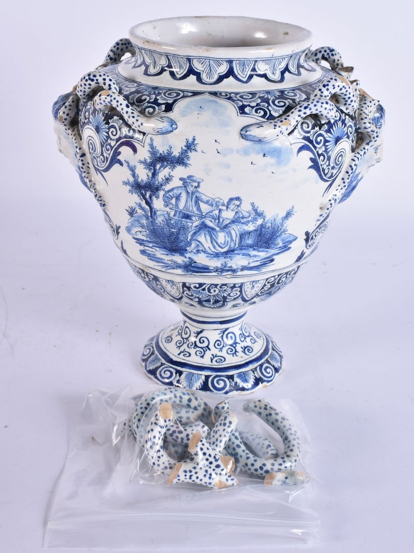 AN 18TH CENTURY DUTCH DELFT TIN GLAZED BLUE AND WHITE VASE painted with figures and landscapes. 22 c (1 of 6)