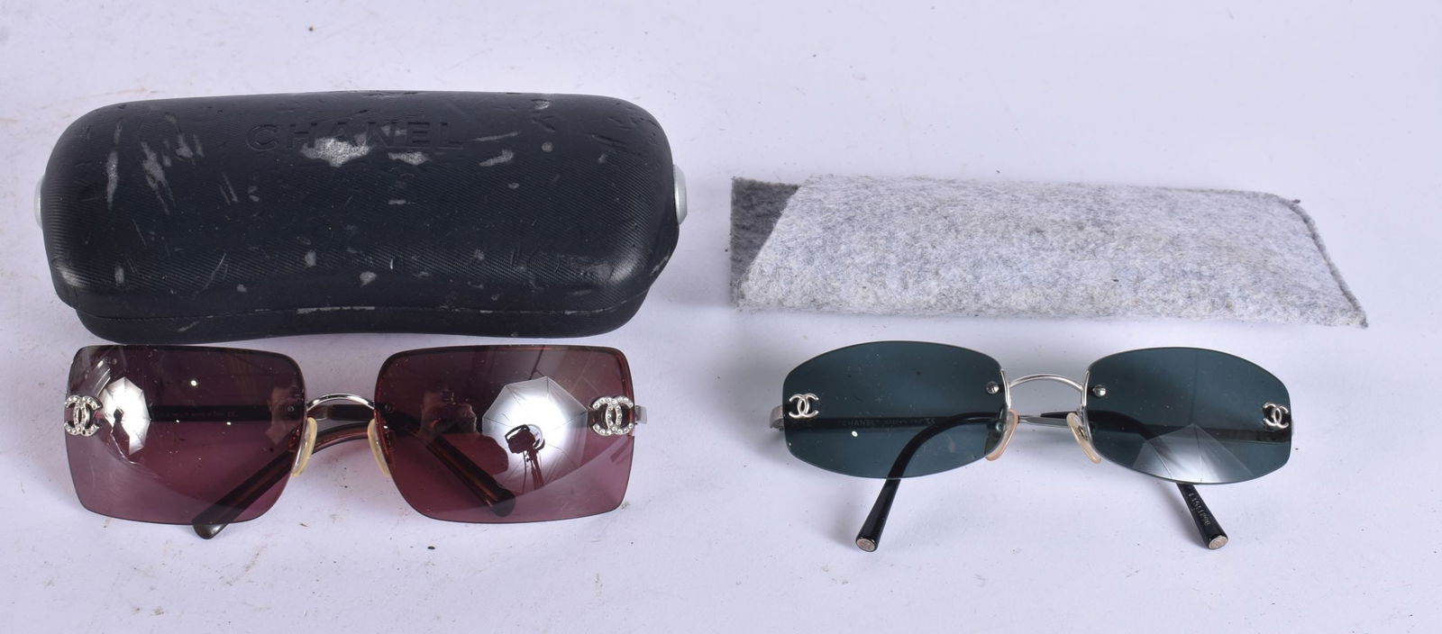 Chanel Designer Sunglasses Rimless w/ Cases. (2) WE ARE UNABLE TO SHIP THIS LOT TO USA/CANADA: Chanel Designer Sunglasses Rimless w/ Cases. (2) WE ARE UNABLE TO SHIP THIS LOT TO USA/CANADA