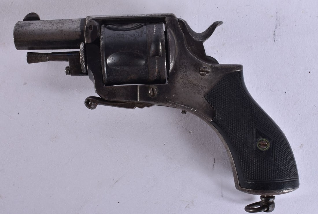 AN ANTIQUE DUTCH REVOLVER by H Mahillon of Brussels. 11.5 cm wide.: AN ANTIQUE DUTCH REVOLVER by H Mahillon of Brussels. 11.5 cm wide.