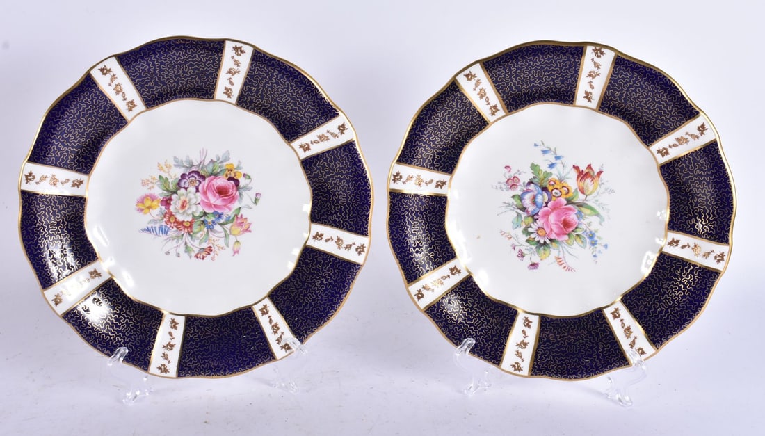 A PAIR OF ROYAL CROWN DERBY PORCELAIN PLATES. 25 cm wide. (1 of 7)