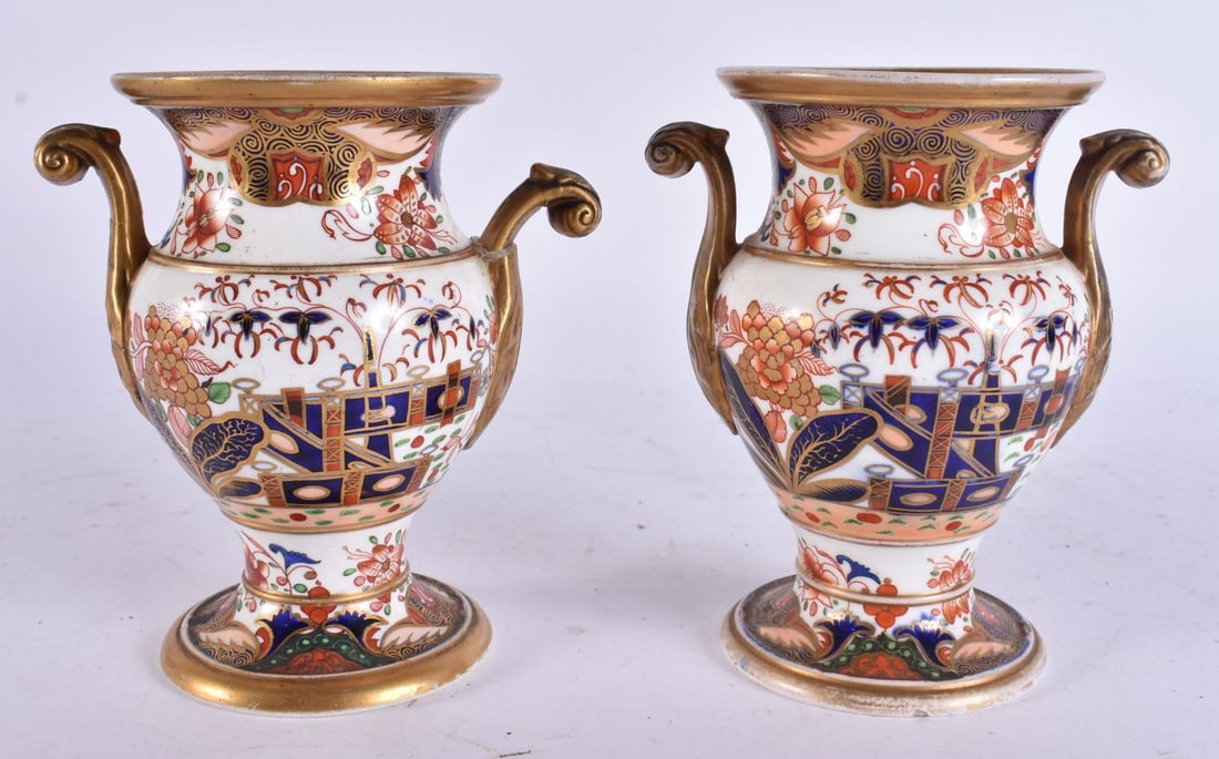 A PAIR OF 19TH CENTURY SPODE 967 IMARI PORCELAIN VASES painted with fenced gardens. 13.25 cm high. (1 of 5)