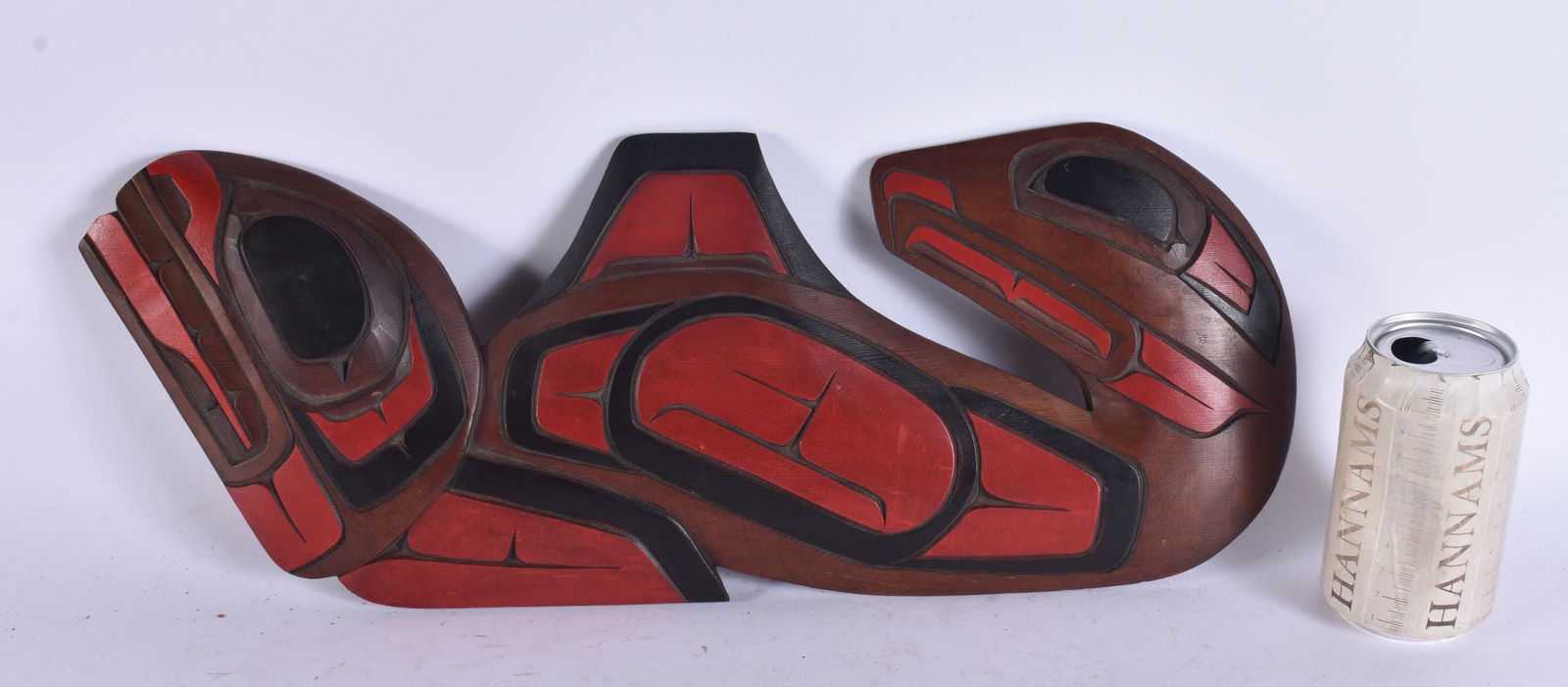 A LARGE NORTH AMERICAN CARVED TRIBAL HAIDA WOOD PLAQUE. 44 cm x 18 cm.: A LARGE NORTH AMERICAN CARVED TRIBAL HAIDA WOOD PLAQUE. 44 cm x 18 cm.