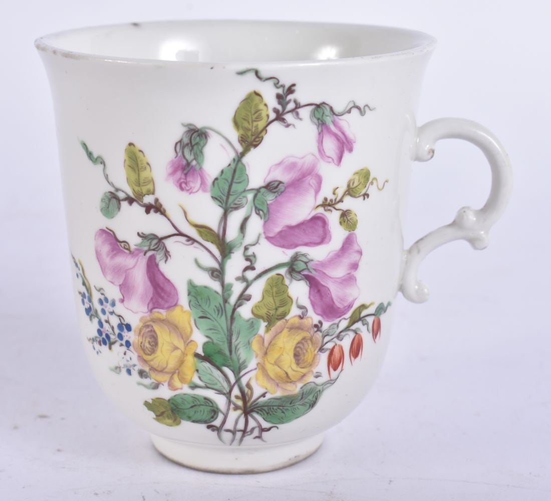 AN 18TH CENTURY EUROPEAN PORCELAIN COFFEE CUP painted with flowers (incised C to base). 7.25 cm high (1 of 6)