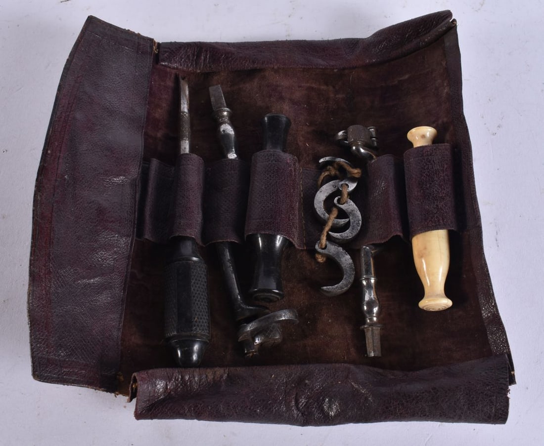 AN UNUSUAL ANTIQUE DENTAL EXTRACTION KIT. (qty): AN UNUSUAL ANTIQUE DENTAL EXTRACTION KIT. (qty)