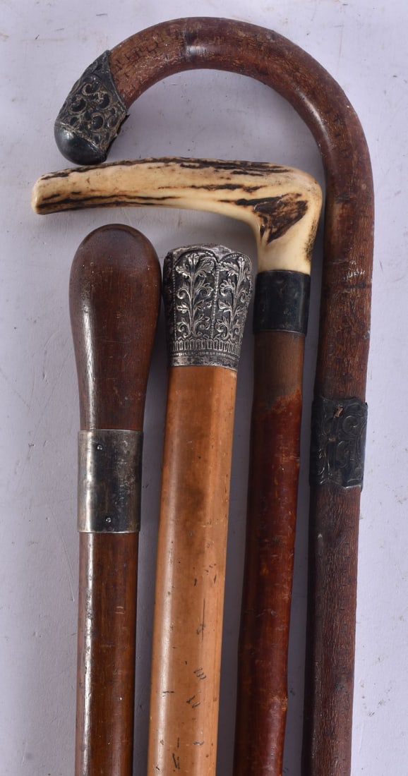 ASSORTED ANTIQUE WALKING CANES. 90 cm long. (4): ASSORTED ANTIQUE WALKING CANES. 90 cm long. (4)