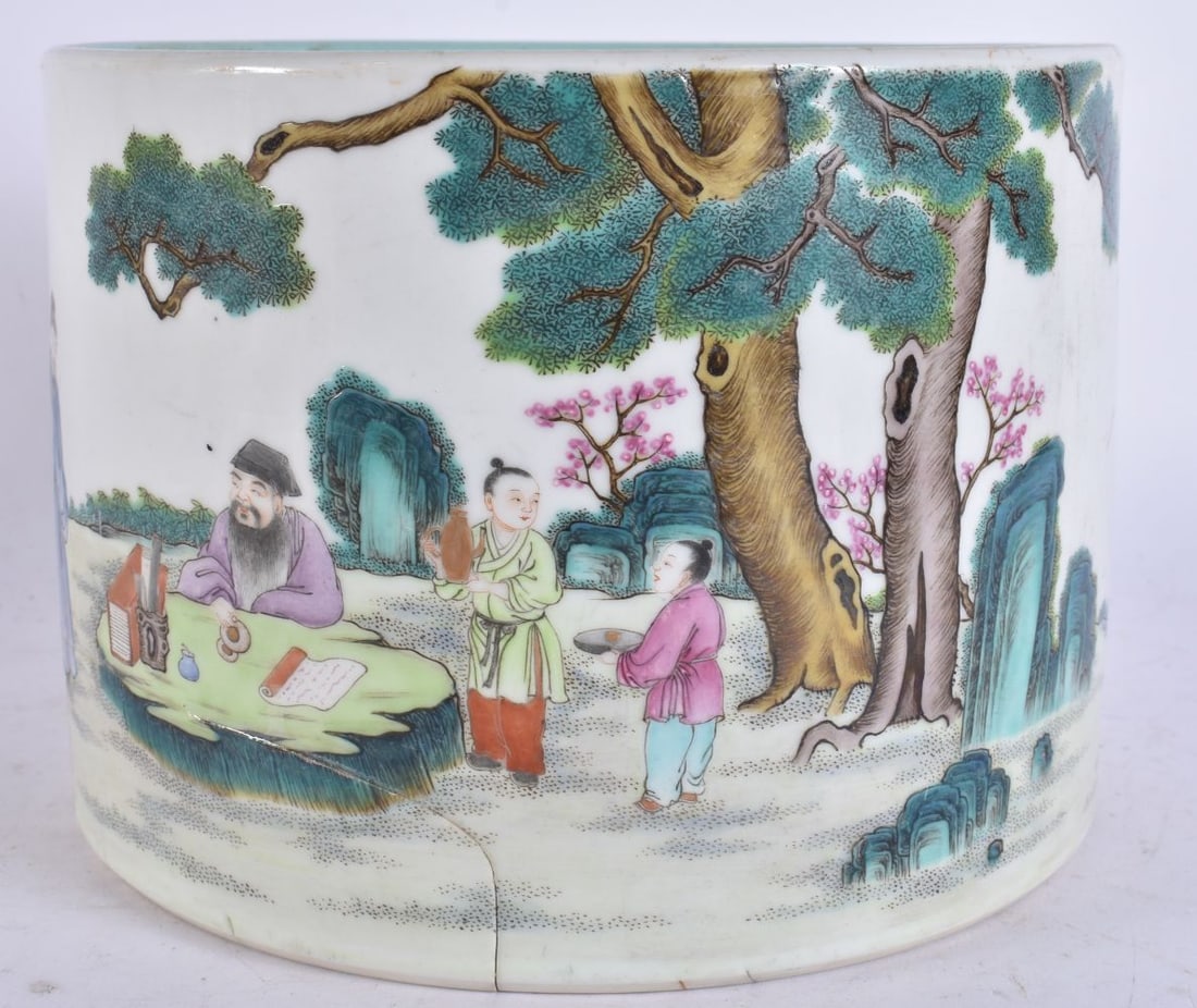 A RARE CHINESE QING DYNASTY FAMILLE ROSE PORCELAIN BITONG BRUSH POT bearing Qianlong marks to base. (1 of 13)