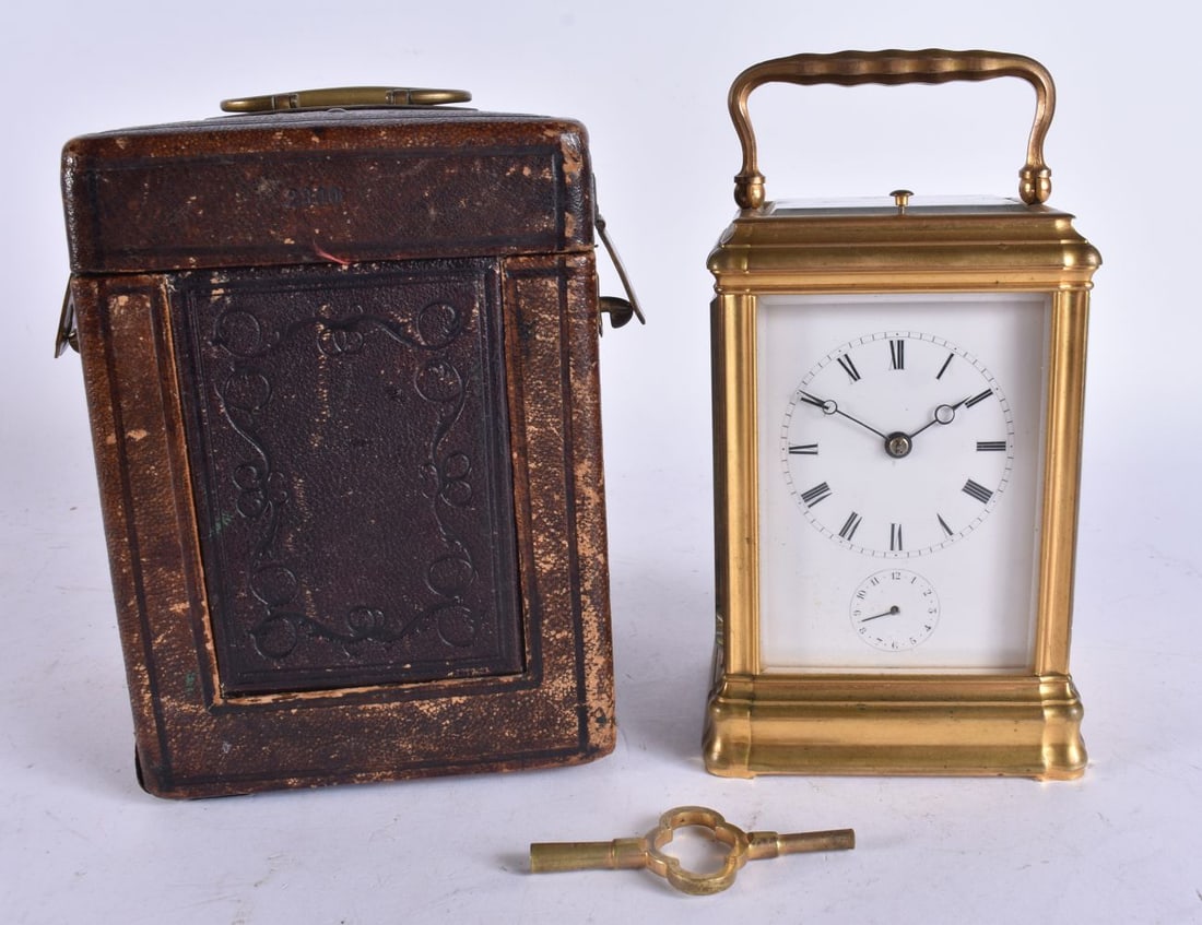 AN ANTIQUE REPEATING BRASS CARRIAGE CLOCK with Petit & Grand Sonnerie features. 18 cm high inc handl (1 of 8)