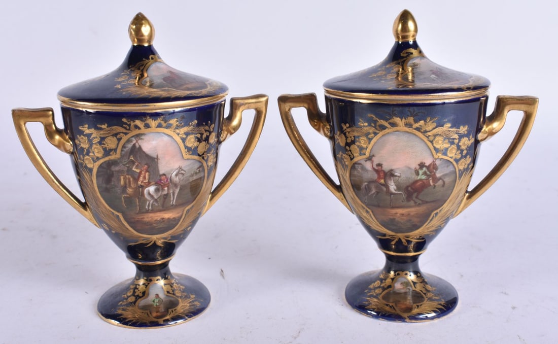 A PAIR OF ANTIQUE VIENNA PORCELAIN TWIN HANDLED VASES AND COVERS painted with figures on horses. 12 (1 of 6)