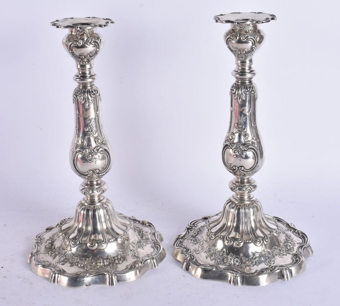 A FINE PAIR OF STERLING SILVER ROCOCO CANDLESTICKS. 2300 grams. 27cm high. (1 of 7)