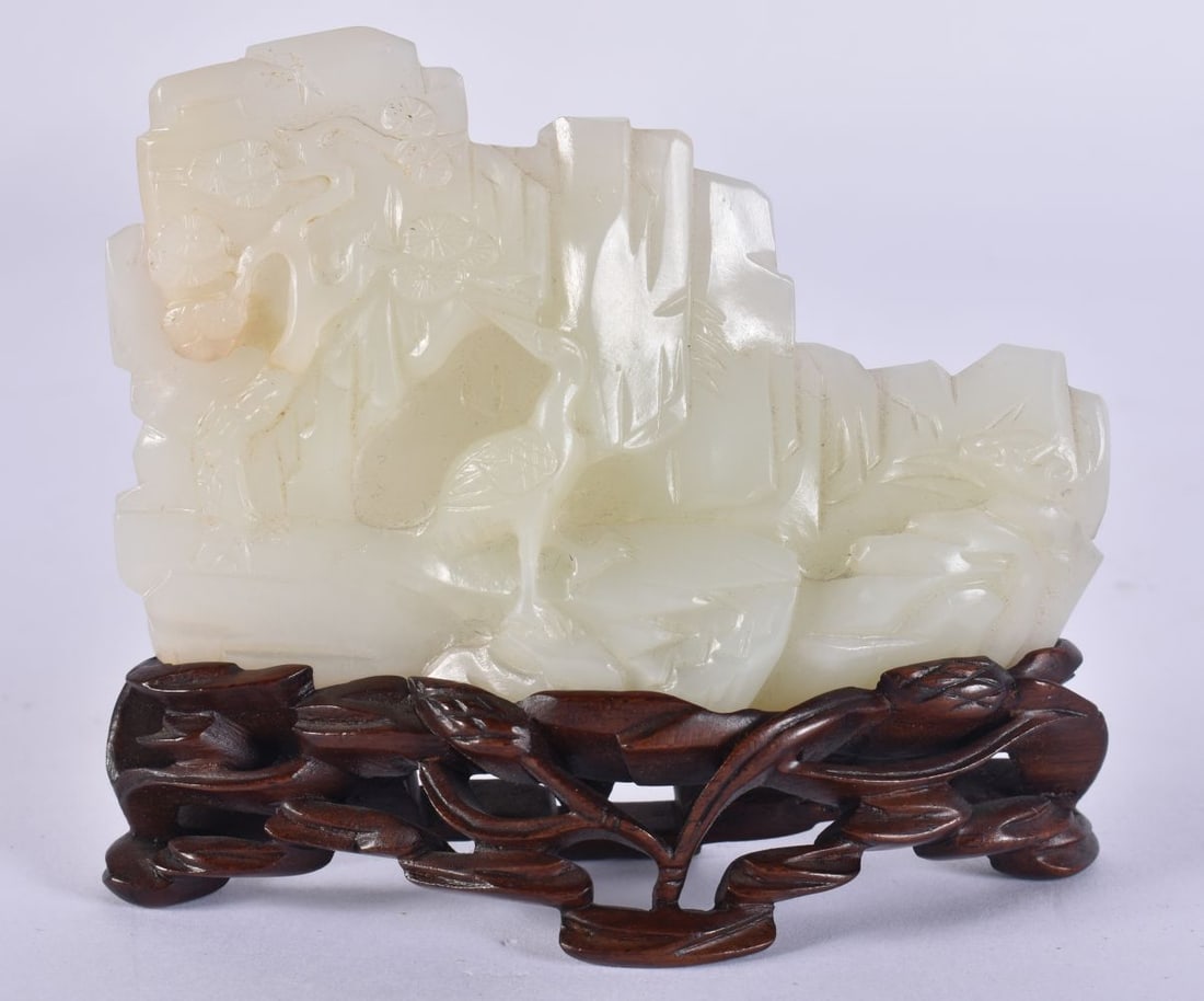 A FINE 18TH CENTURY CHINESE WHITE JADE SCHOLARS MOUNTAIN Qianlong, Ex Marchant London, formed with a (1 of 11)