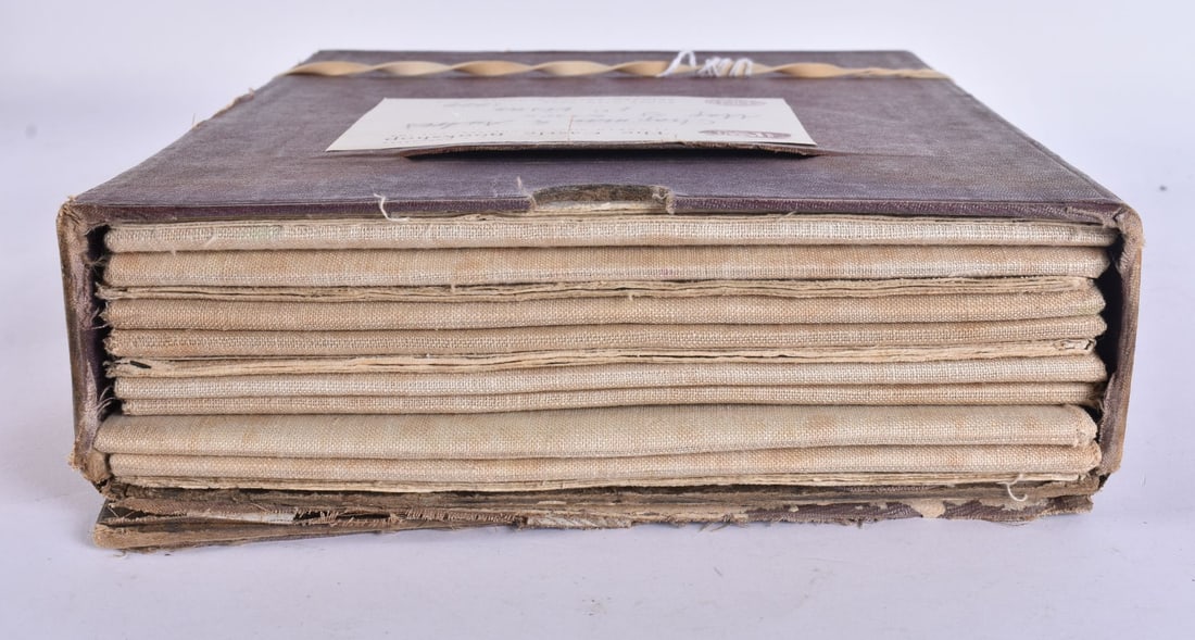 A collection of political cartoons from The Daily Mail, mostly 1940, housed in a Walker's Century Sc (1 of 6)