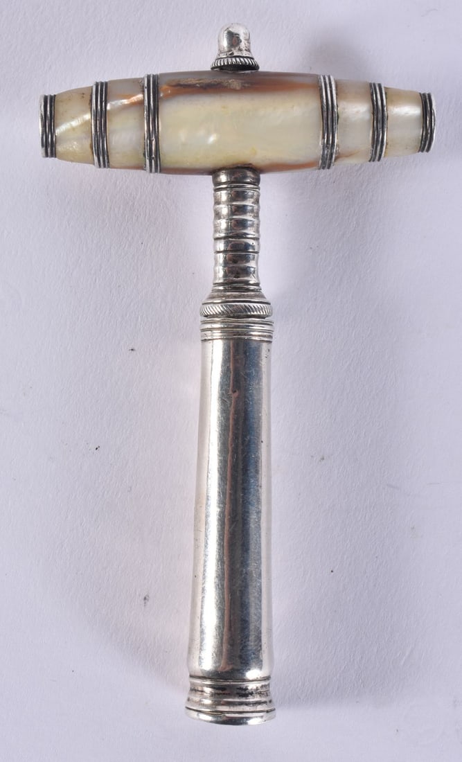 AN EARLY 19TH CENTURY SILVER CASED MOTHER OF PEARL CORKSCREW. 28 grams. 8 cm long.: AN EARLY 19TH CENTURY SILVER CASED MOTHER OF PEARL CORKSCREW. 28 grams. 8 cm long.