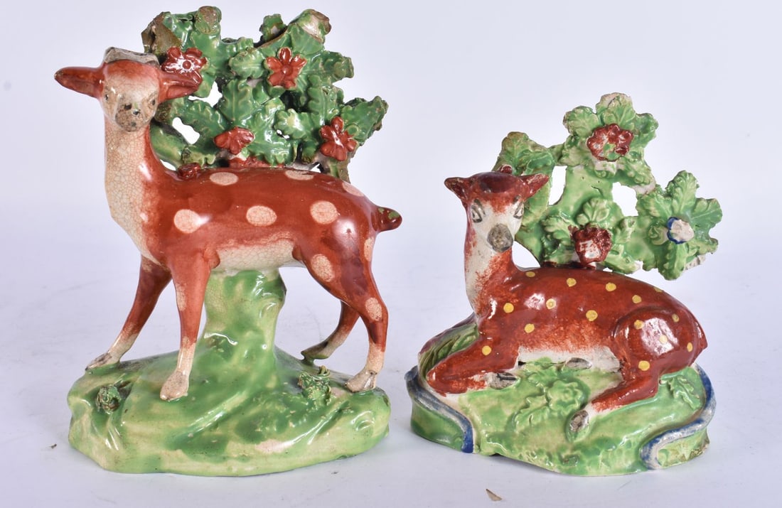 TWO EARLY 19TH CENTURY STAFFORDSHIRE RED GLAZED POTTERY DEER. Largest 15 cm high. (2): TWO EARLY 19TH CENTURY STAFFORDSHIRE RED GLAZED POTTERY DEER. Largest 15 cm high. (2)