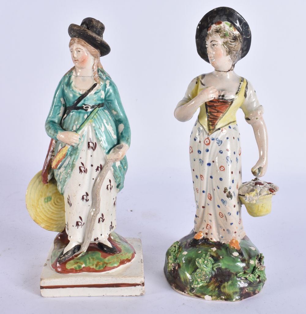 TWO EARLY 19TH CENTURY ENGLISH POTTERY STAFFORDSHIRE FIGURES. 18 cm high. (2) (1 of 7)