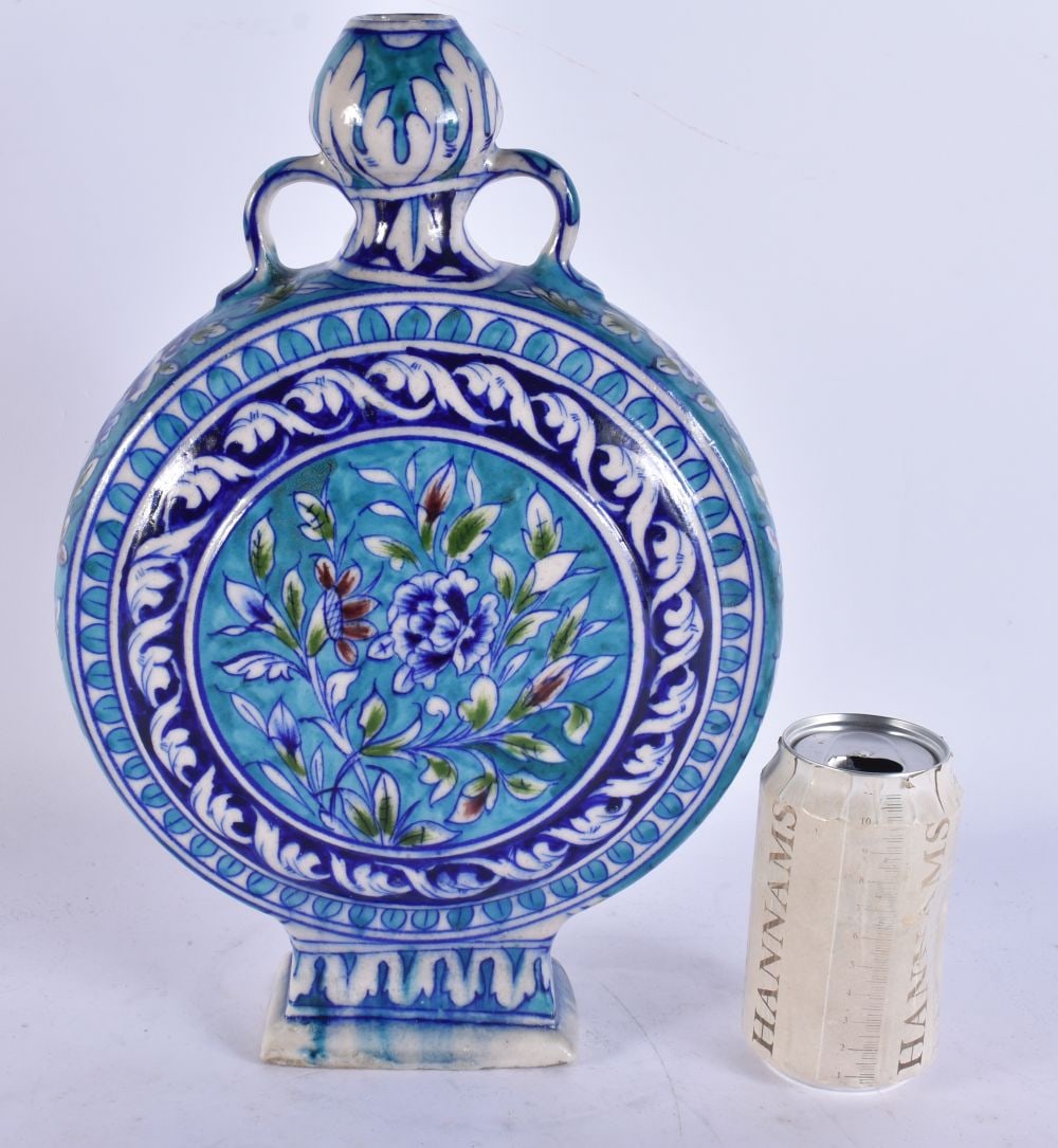 AN UNUSUAL ANTIQUE ISLAMIC MIDDLE EASTERN TWIN HANDLED FLASK. 36 cm high.: AN UNUSUAL ANTIQUE ISLAMIC MIDDLE EASTERN TWIN HANDLED FLASK. 36 cm high.