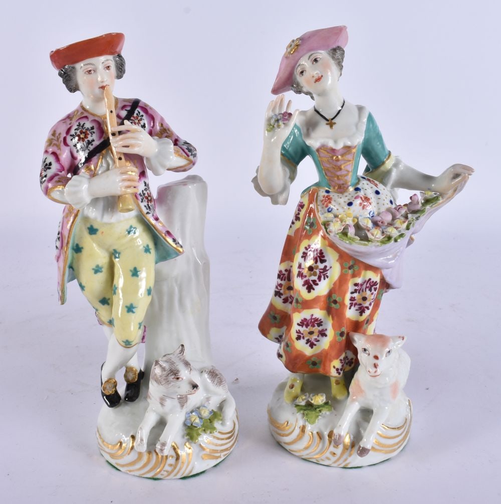 A PAIR OF ANTIQUE CONTINENTAL PORCELAIN FIGURES. 18.5 cm high. (1 of 7)