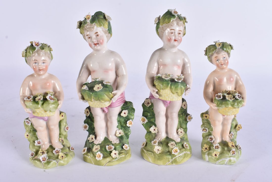 FOUR 19TH CENTURY CONTINENTAL PORCELAIN FIGURES modelled encrusted with flowers. Largest 14.5 cm hig (1 of 6)