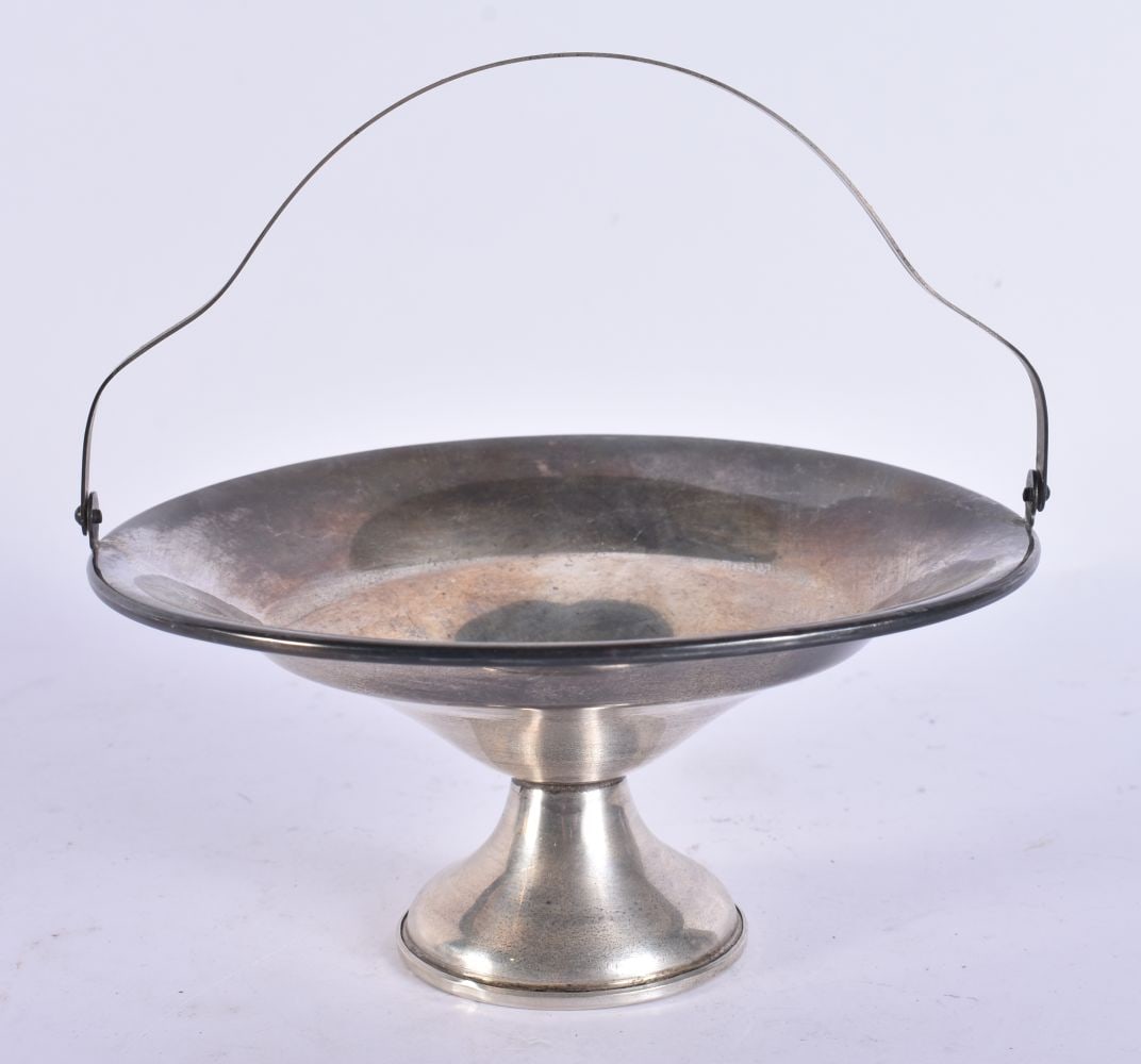 A SILVER SWING HANDLED BOWL. 106 grams overall. 14.5 cm high inc handle. (1 of 5)