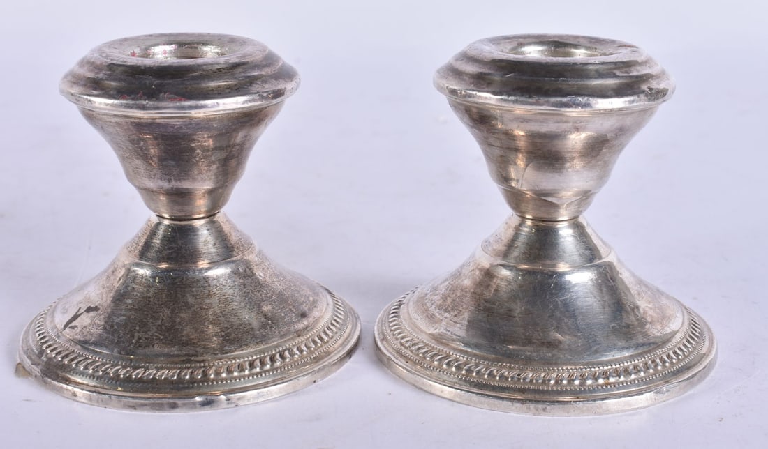 A PAIR OF SILVER CANDLESTICKS. 245 grams. 6.5 cm high. (1 of 5)