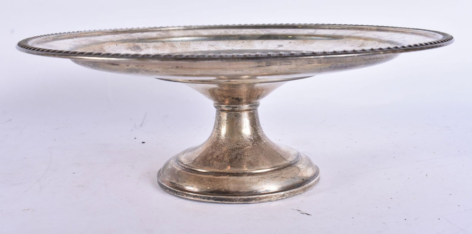 A SILVER PEDESTAL DISH. 635 grams overall. 26 cm wide. (1 of 4)