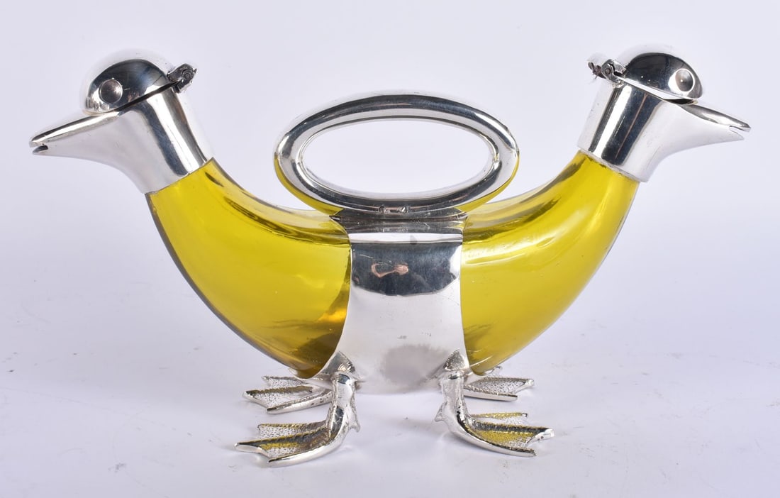 A SILVER PLATED DUCK GLASS DECANTER. 27cm wide. (1 of 5)
