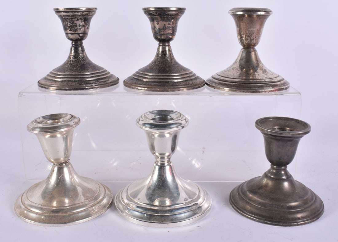 THREE PAIRS OF SILVER CANDLESTICKS. 1770 grams overall. (6) (1 of 6)
