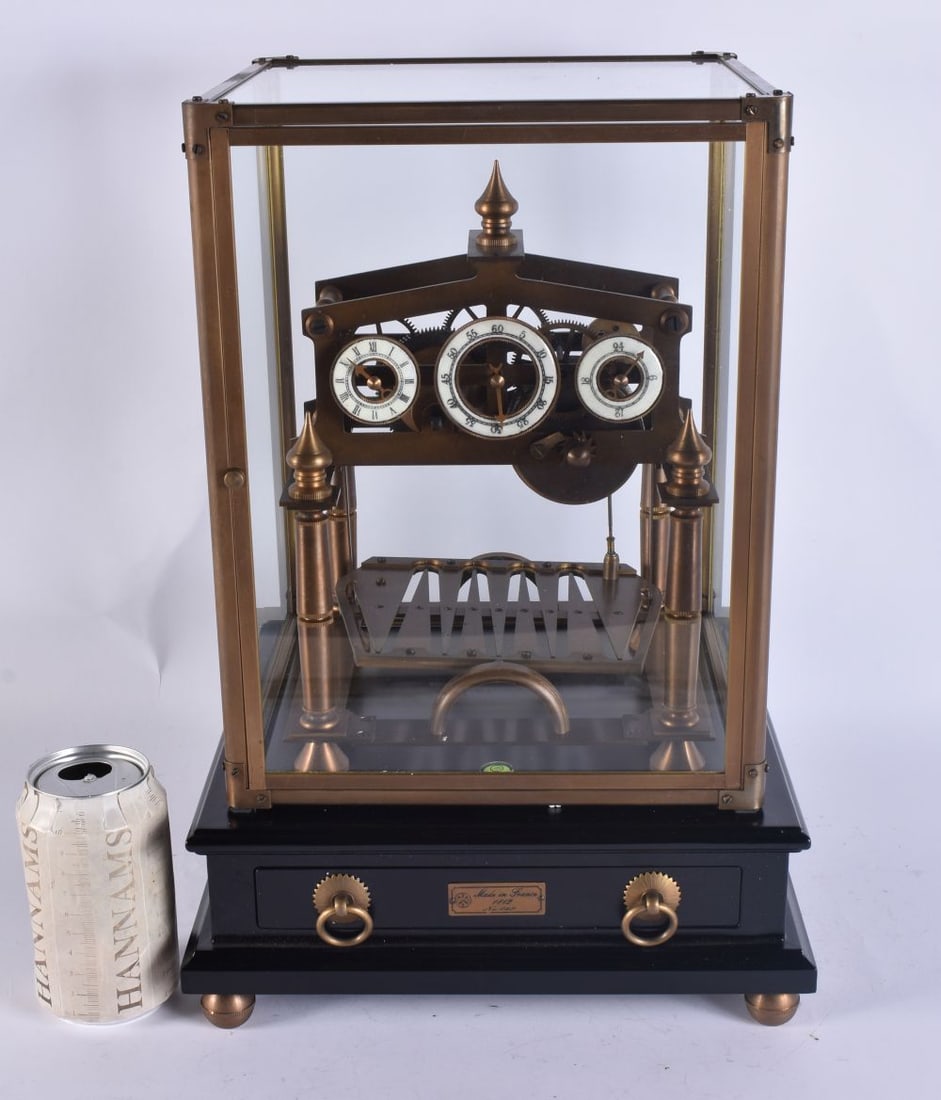 A CONGREAVE SKELETON ROLLING BALL CLOCK. 40 cm x 25 cm. (1 of 7)