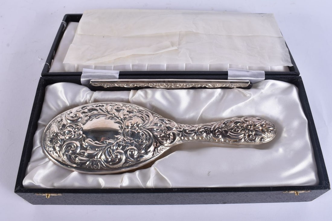 A BOXED SILVER BRUSH AND COMB. 27cm wide. (1 of 4)
