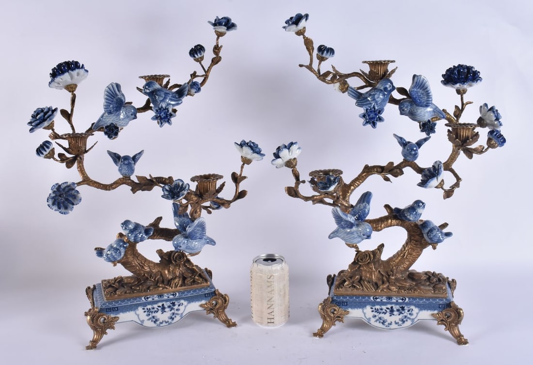 A LARGE PAIR OF BRONZE POTTERY BIRD CANDLESTICKS. 50 cm x 30 cm.: A LARGE PAIR OF BRONZE POTTERY BIRD CANDLESTICKS. 50 cm x 30 cm.