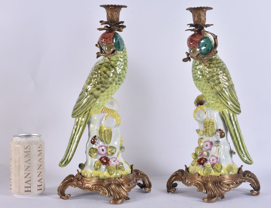 A PAIR OF BRONZE MOUNTED PARROT POTTERY CANDLESTICKS. 48 cm long.: A PAIR OF BRONZE MOUNTED PARROT POTTERY CANDLESTICKS. 48 cm long.