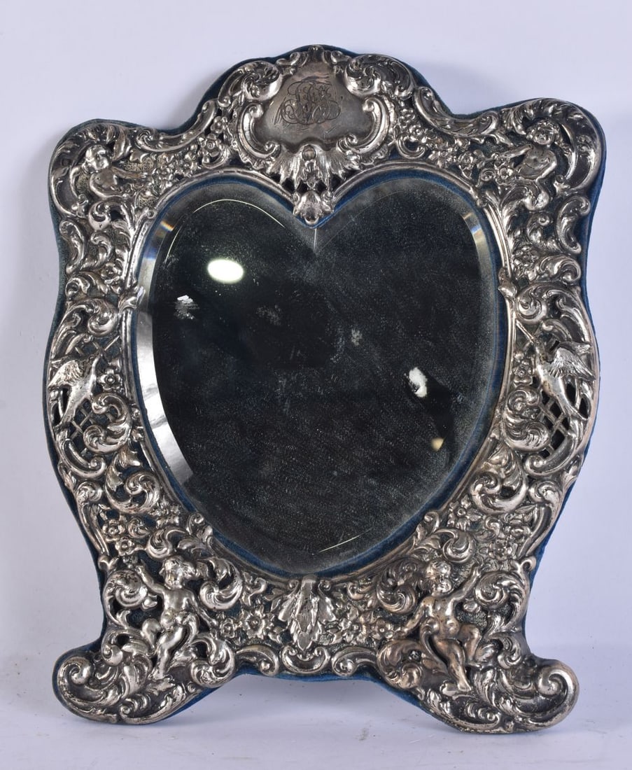 AN ANTIQUE SILVER REPOUSSE MIRROR. 28cm x 18 cm. (1 of 4)