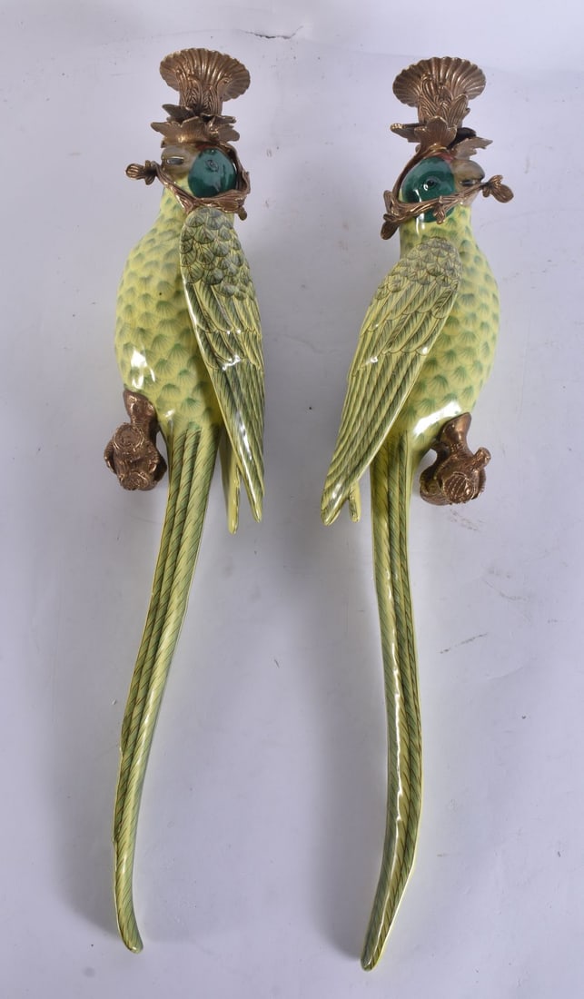 A PAIR OF BRONZE MOUNTED PARROT POTTERY CANDLESTICKS. 37 cm high.: A PAIR OF BRONZE MOUNTED PARROT POTTERY CANDLESTICKS. 37 cm high.