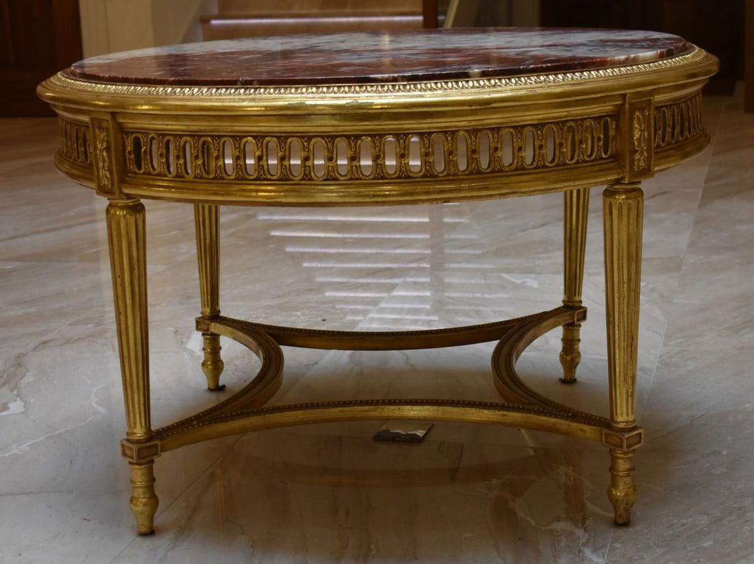 A LARGE EUROPEAN GILTWOOD MARBLE INSET TABLE with floral capped columns and openwork frieze. 103 cm (1 of 6)