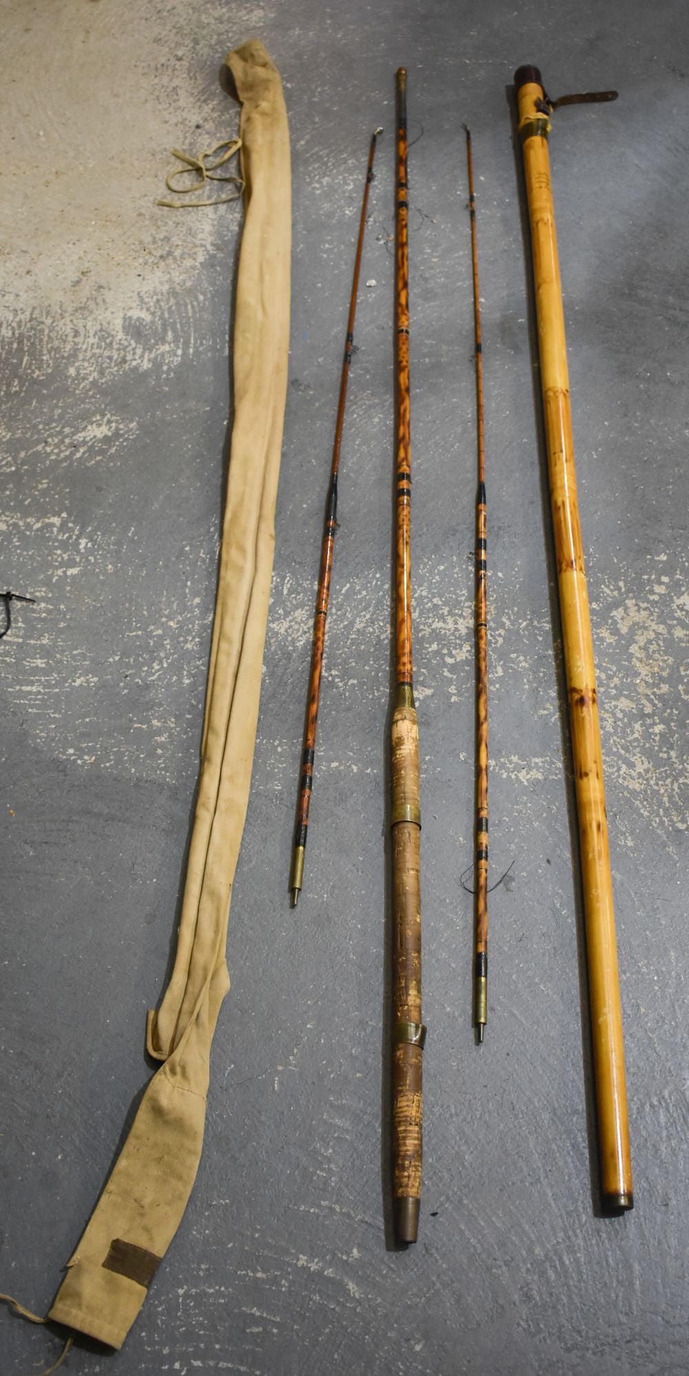 A VERY LARGE BAMBOO FISHING POLE and Hardys rod. (2) (1 of 7)