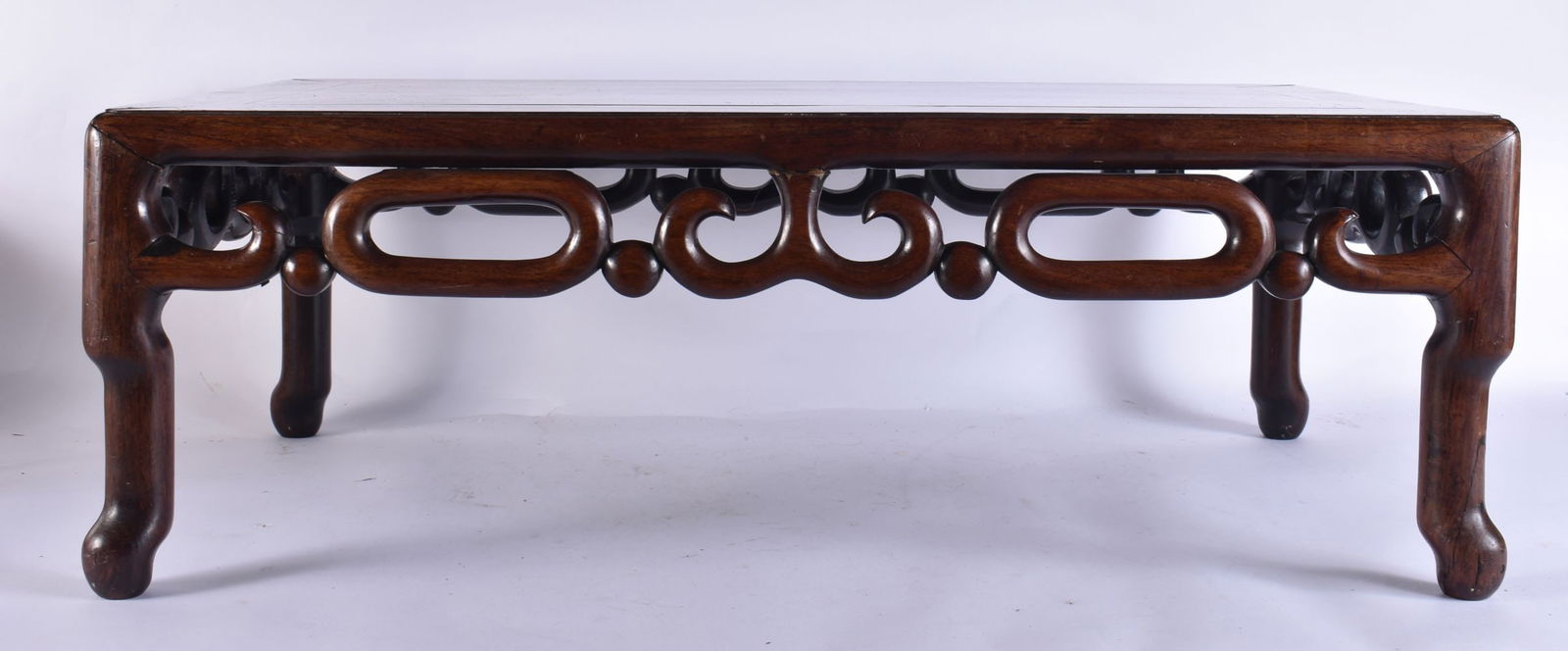 A 19TH CENTURY CHINESE CARVED HARDWOOD LOW TABLE Qing. 72 cm x 48 cm x 28cm. (1 of 4)