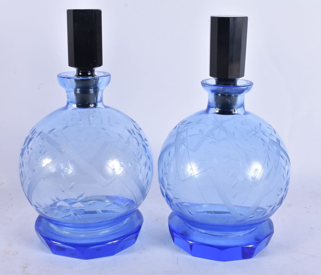 A PAIR OF BOHEMIAN GLASS SCENT BOTTLES. 21.5 cm high. (1 of 3)