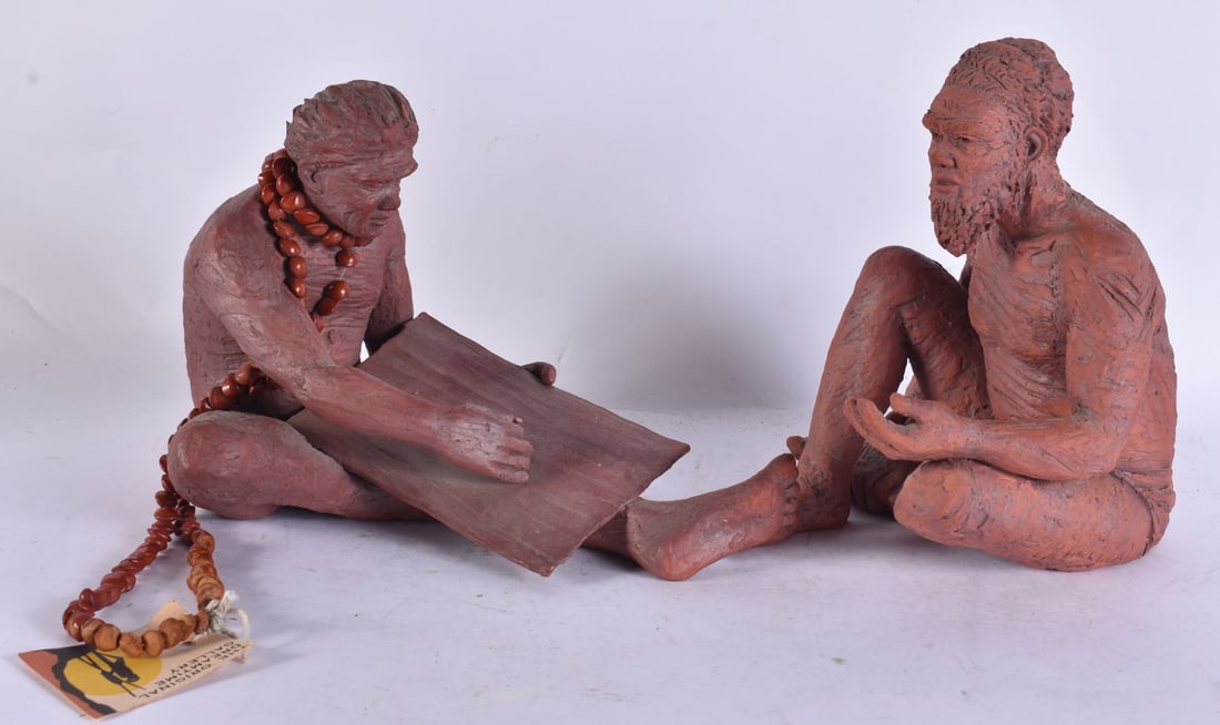 A PAIR OF AUSTRALIAN CLAY POTTERY TRIBAL FIGURE. Largest 21 cm x 18 cm.: A PAIR OF AUSTRALIAN CLAY POTTERY TRIBAL FIGURE. Largest 21 cm x 18 cm.