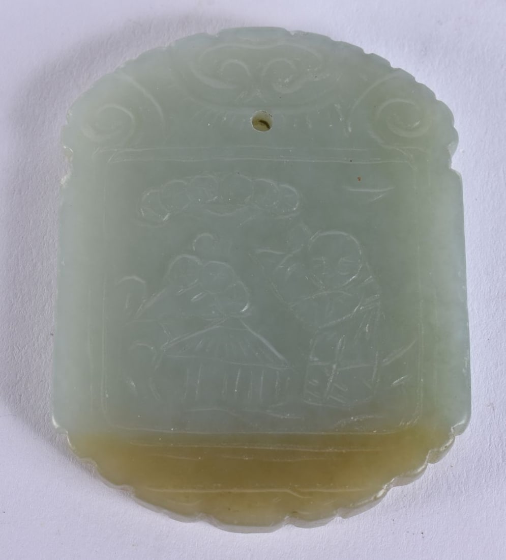A CHINESE GREEN JADE PLAQUE. 6 cm x 4.5 cm.: A CHINESE GREEN JADE PLAQUE. 6 cm x 4.5 cm.