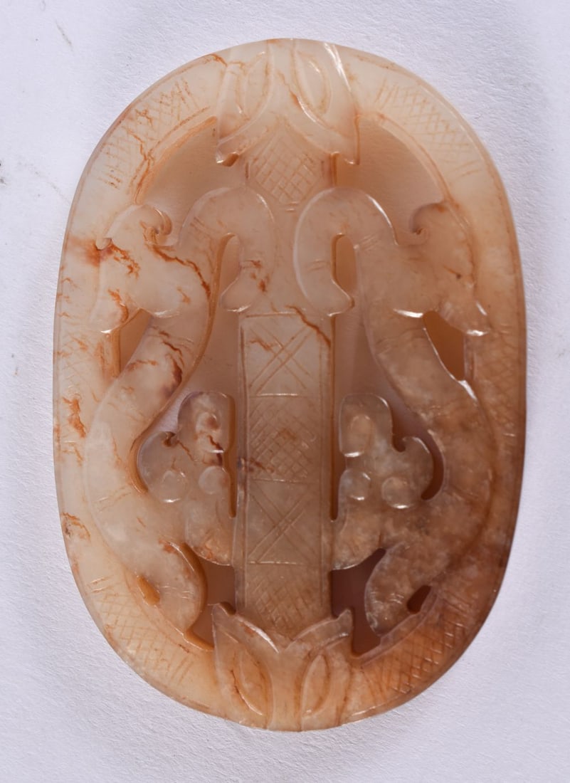 A CHINESE QING DYNASTY RUSSET JADE BEAST PLAQUE. 6 cm x 4.5 cm. (1 of 3)