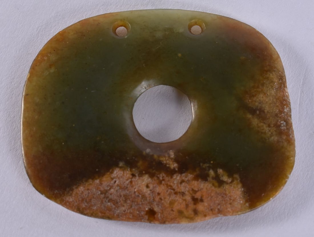A CHINESE QING DYNASTY GREEN RUSSET JADE PLAQUE. 6 cm x 5.5 cm. (1 of 3)
