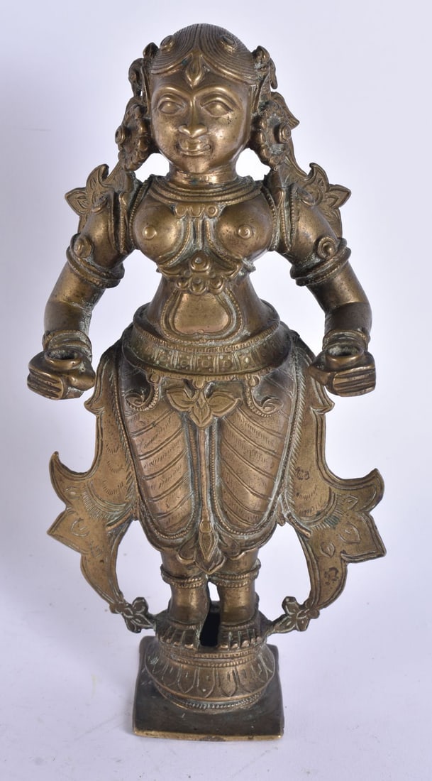 A FINE 18TH/19TH CENTURY INDIAN BRONZE FIGURE OF A FEMALE DEITY modelled upon a square base. 20 cm h (1 of 12)