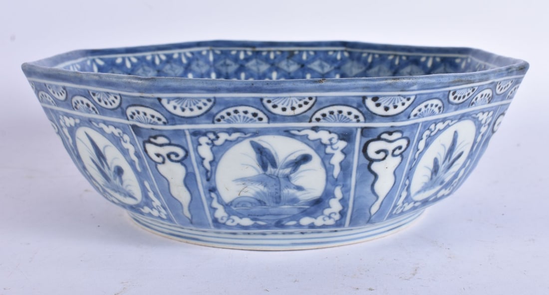 AN 18TH CENTURY JAPANESE EDO PERIOD BLUE AND WHITE PORCELAIN OCTAGONAL BOWL painted with flowers. 22 (1 of 5)