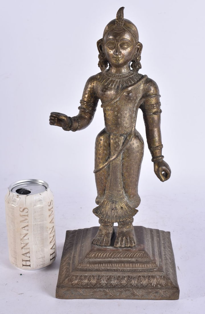 A LARGE 19TH CENTURY INDIAN BRONZE FIGURE OF A FEMALE DEITY modelled upon a square form base. 35 cm (1 of 7)