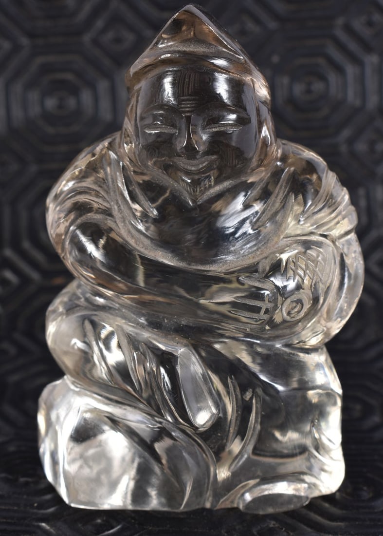 A CHINESE QING DYNASTY CARVED ROCK CRYSTAL FISHERMAN. 8.5 cm x 5 cm.: A CHINESE QING DYNASTY CARVED ROCK CRYSTAL FISHERMAN. 8.5 cm x 5 cm.